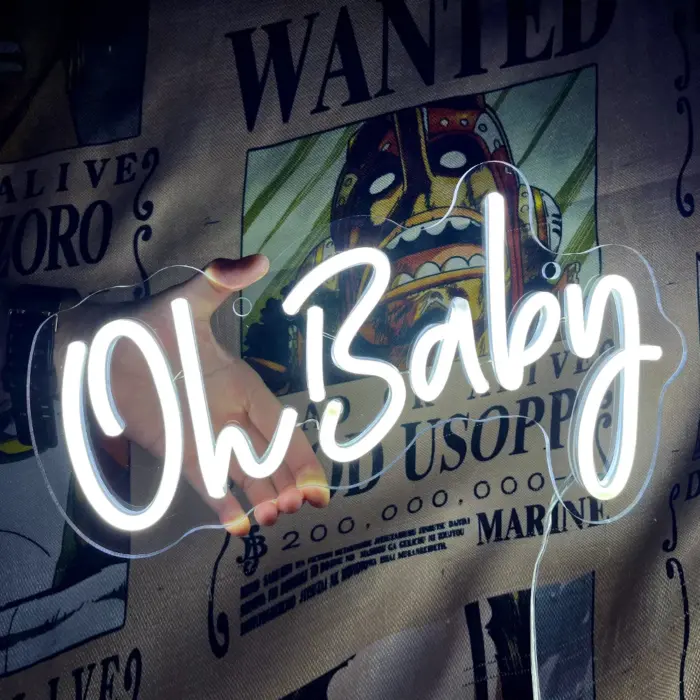 Custom neon sign in white light spelling “Oh Baby” – ideal for kids room decor or baby showers.