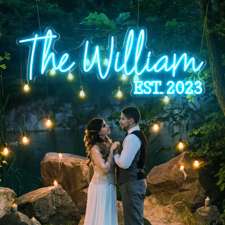 Custom neon sign with name in icy blue, perfect for wedding and romantic decor.