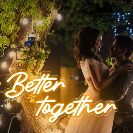 Romantic yellow "Better Together" custom neon light for wedding and Love Day decor, displayed outdoors.