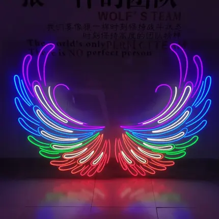 Personalized angel wing wall neon lights in vibrant rainbow colors, ideal as an outdoor LED sign.